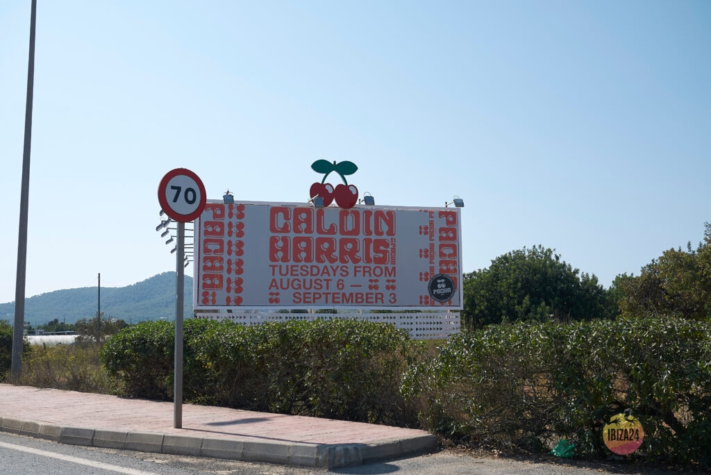 Vibrant clubbing ads along Ibiza roads showcasing famous nightlife spots