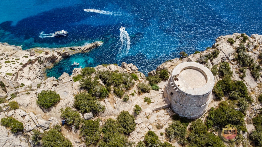Aerial view of Torre des Savinar overlooking Es Vedrà in Ibiza