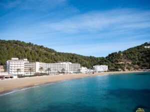 Quiet Ibiza Cala San Vicente beach with empty sands in February