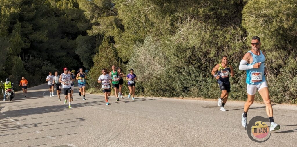 Runners racing along Ibiza Marathon’s scenic coastal route