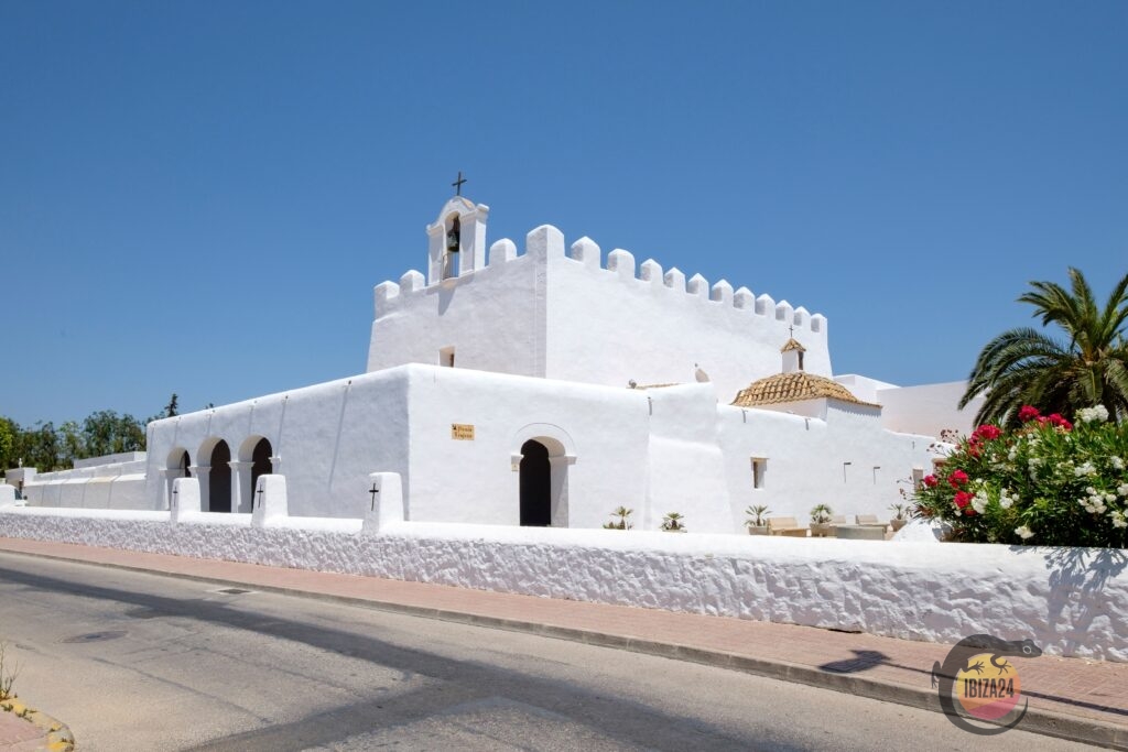 The whitewashed Sant Jordi Church under clear Ibiza skies