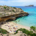 Secluded Cala Escondida cove with turquoise waters near Cala Comte, Ibiza